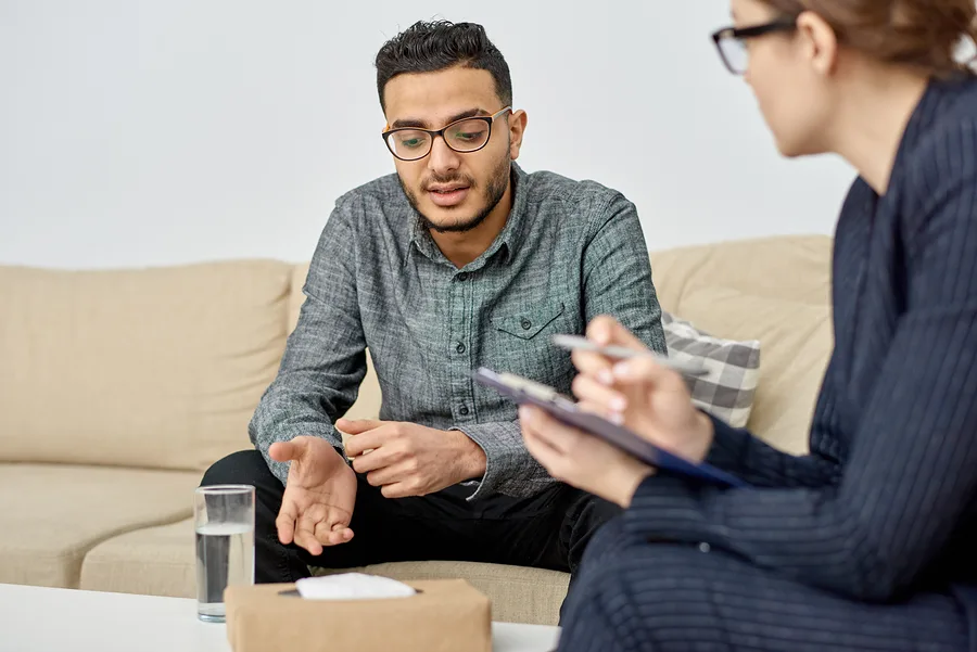 A young person receives counseling to help with coming out