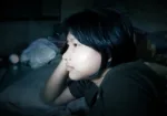 teenager watching a screen