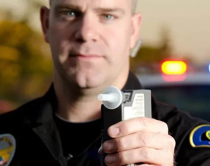 police officer and breathalyzer
