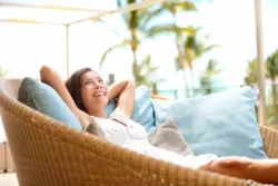 Benefits of Biofeedback Therapy for Adults woman sitting and enjoying herself
