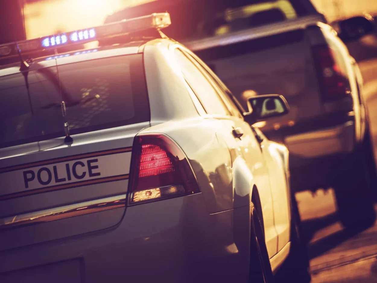 A police officer pulls over a driver for driving under the influence of marijuana