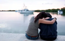 couple leaning on each other