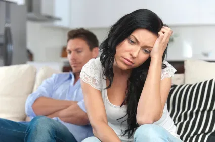 couple sitting apart