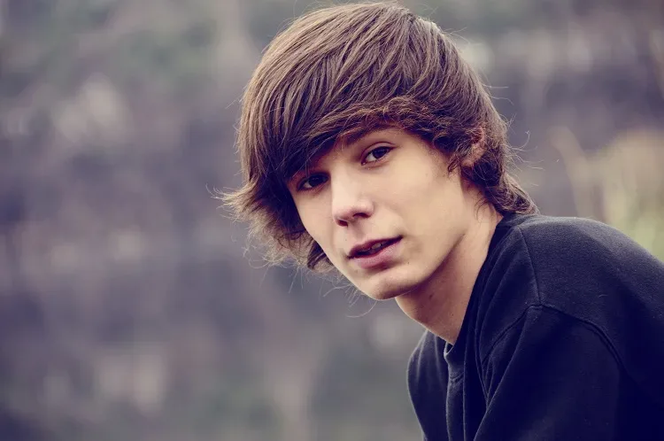 teenager with long hair