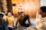 friends-playing-guessing-game-at-home-stockpack-gettyimages Friends playing guessing game at home