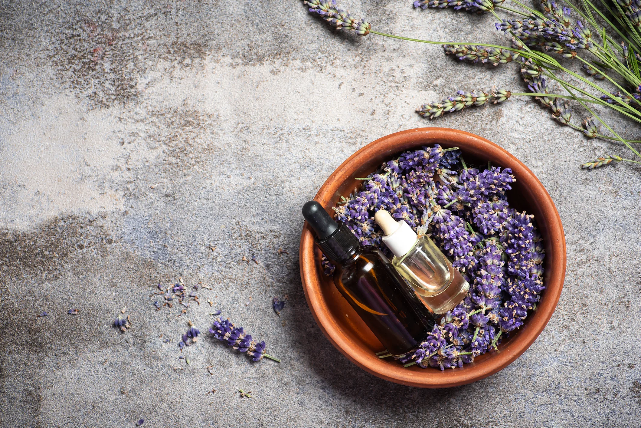 lavendar and essential oils in a bowl aromatherapy