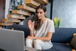 Therapy. A woman having online therapy session with her therapist