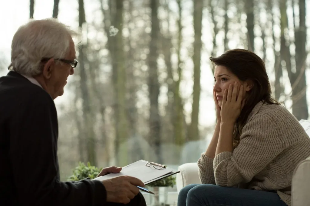 counselor speaking with client
