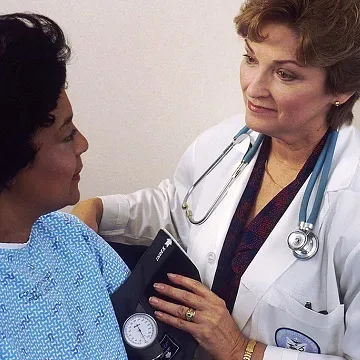 doctor speaking with patient
