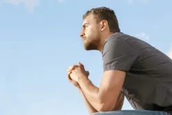 man sitting and thinking