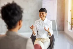 shot-of-a-young-woman-having-a-therapeutic-session-with-a-psychologist-stockpack-gettyimages Shot of a young woman having a therapeutic session with a psychologist