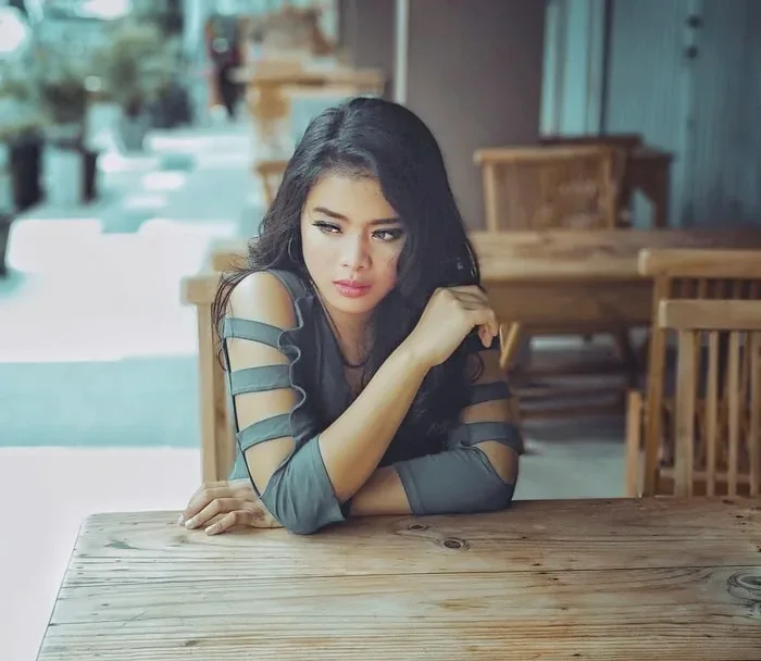 woman sitting by herself