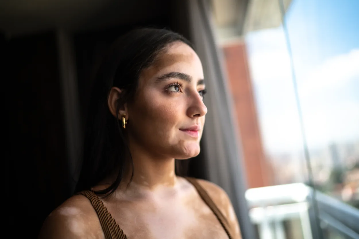 Young woman contemplating at home