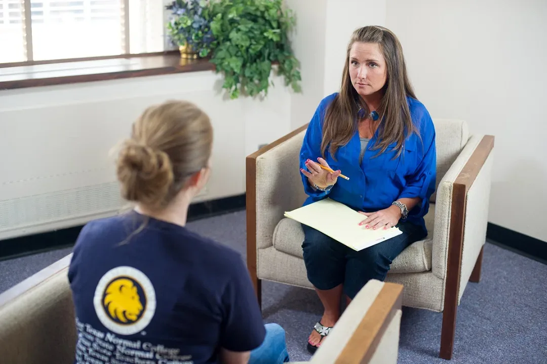 counselor speaking with client